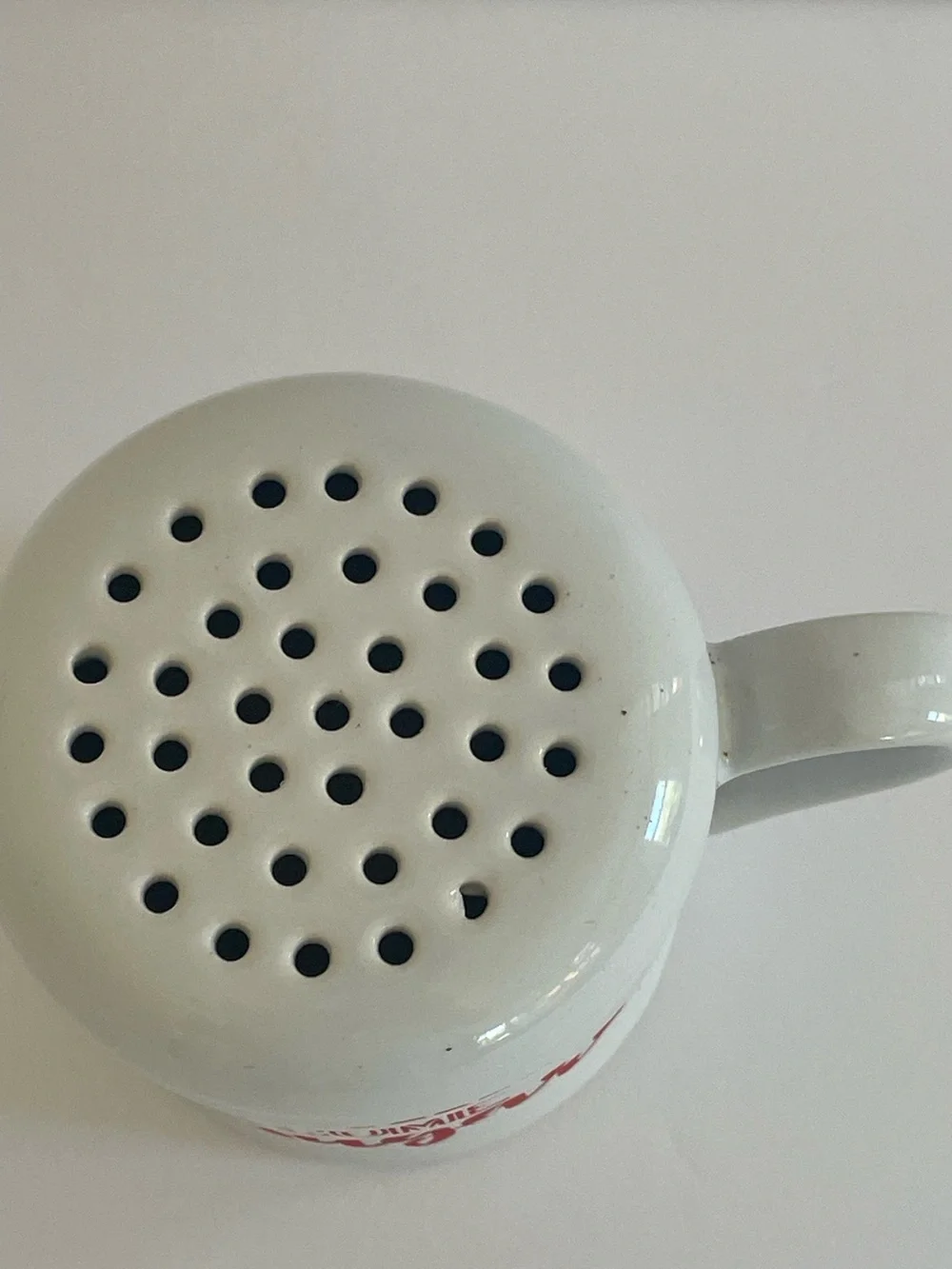 Red and White Ceramic Shaker with “Gimme some Sugar” writing